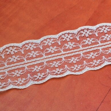 The roll of thin elegant lace, ivory color 1