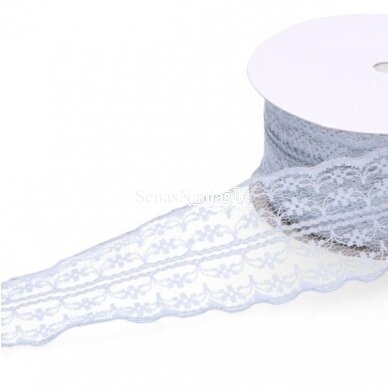 The roll of thin elegant lace, grey color